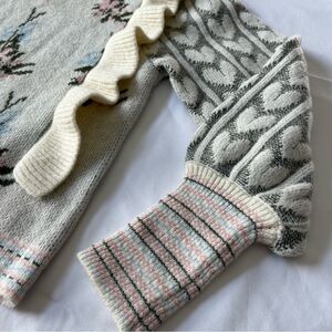 NWT Cozy Knit sweater with Heart Pattern.